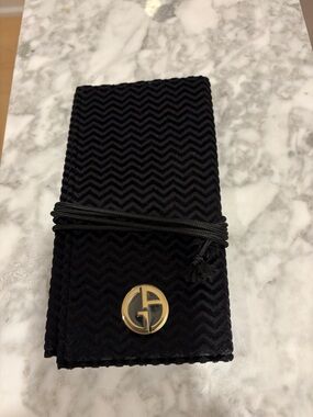 Gorgio Armani black velvet makeup brush holder with gold accents